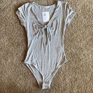 Grey low cut onesie